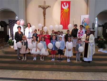 14 eerste communicanten in Heusden