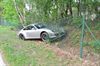 porsche-crasht-door-omheining