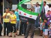 Jongeren betogen tegen geweld in Syrië