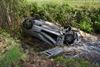 auto-belandt-op-zijn-dak-in-de-laambeek