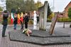 Bloemenhulde aan monument in Heusden