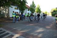 Fietsers werden onthaald op applaus
