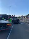 Auto over de kop na botsing op Koerselsebaan