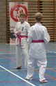Karateka's dragen roze gordel tegen borstkanker