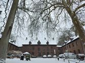 Domherenhof in een winters kleedje