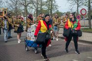 Veel kijkers en groepen bij Heusdense stoet