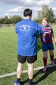 Rugbydames verkopen hun huid duur op benefiet
